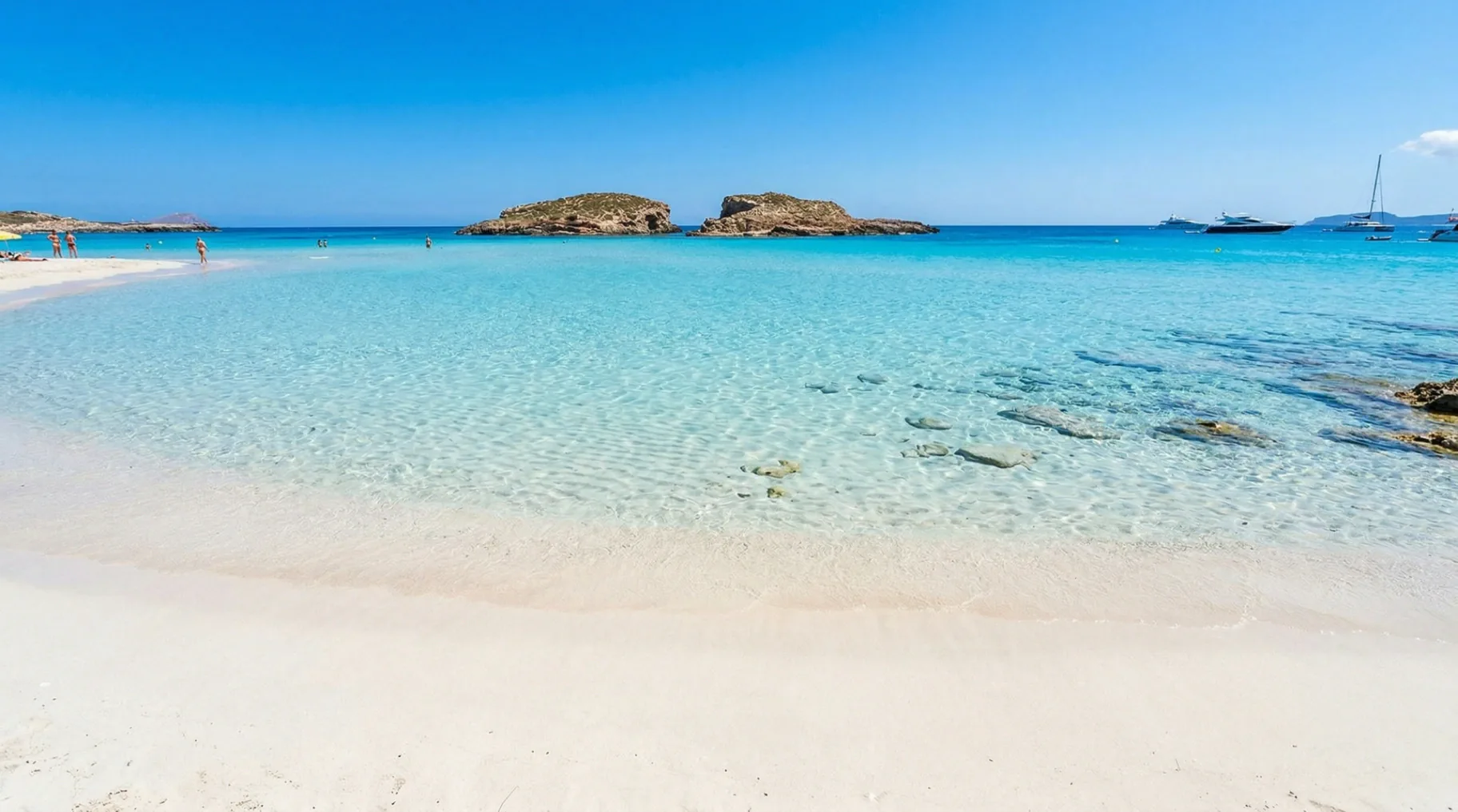 Formentera turquoise waters — Balearic Islands luxury sailing catamaran charter paradise